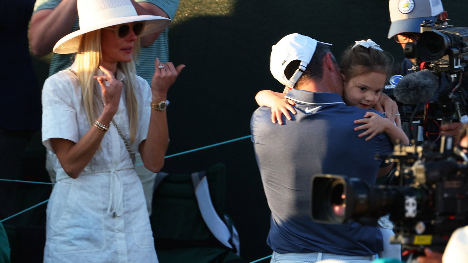 Rory hugs Poppy as Erica watches on